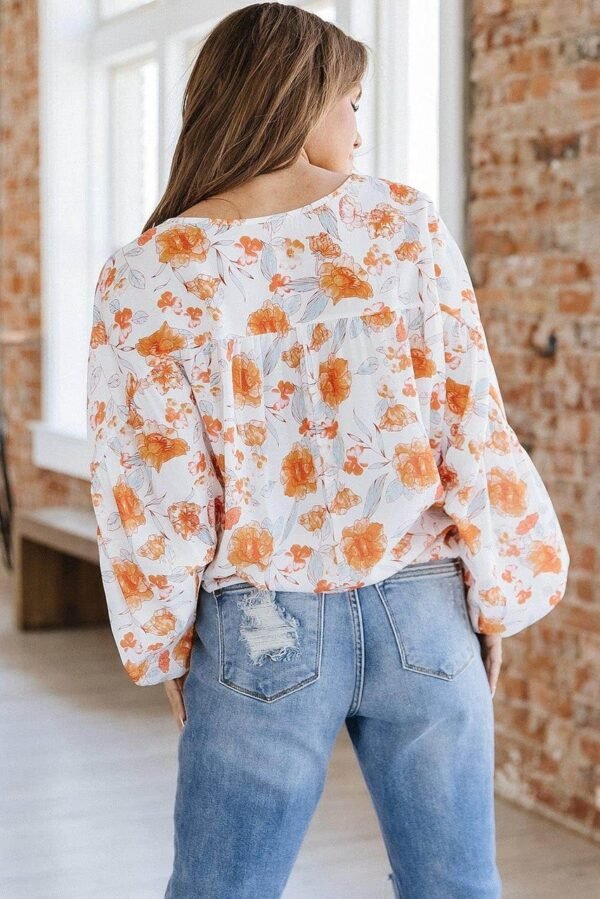 White Tassel Tie V Neck Bubble Sleeve Floral Blouse