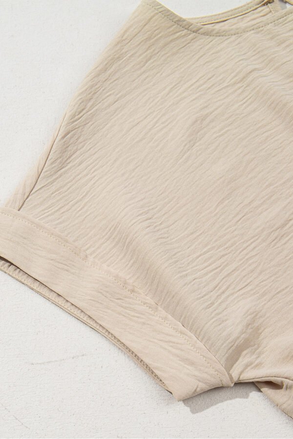 Parchment Solid Color Knotted Hem Short Sleeve Blouse