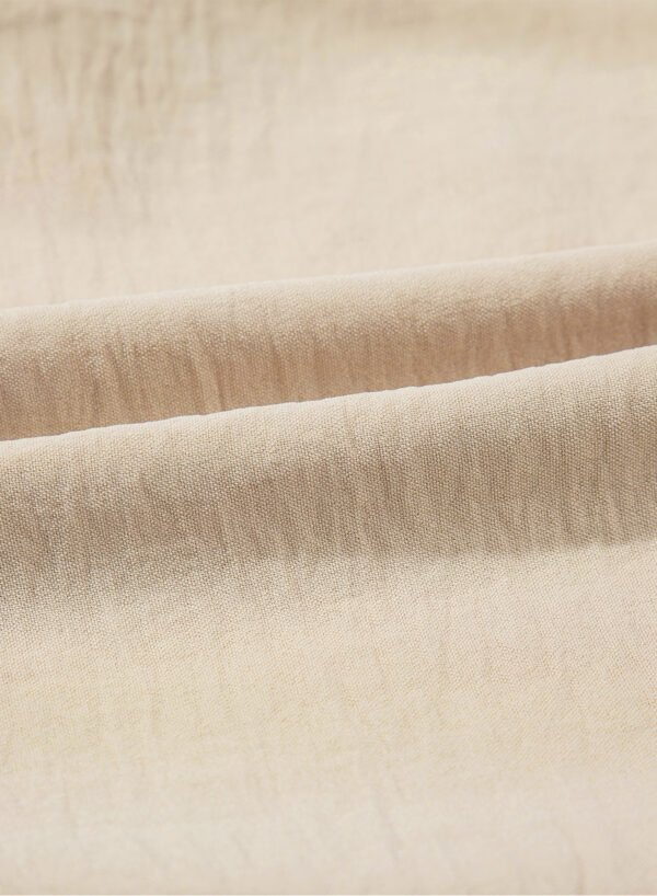 Parchment Solid Color Knotted Hem Short Sleeve Blouse