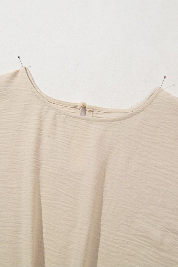 Parchment Solid Color Knotted Hem Short Sleeve Blouse