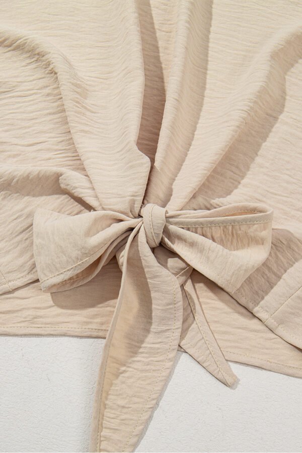 Parchment Solid Color Knotted Hem Short Sleeve Blouse