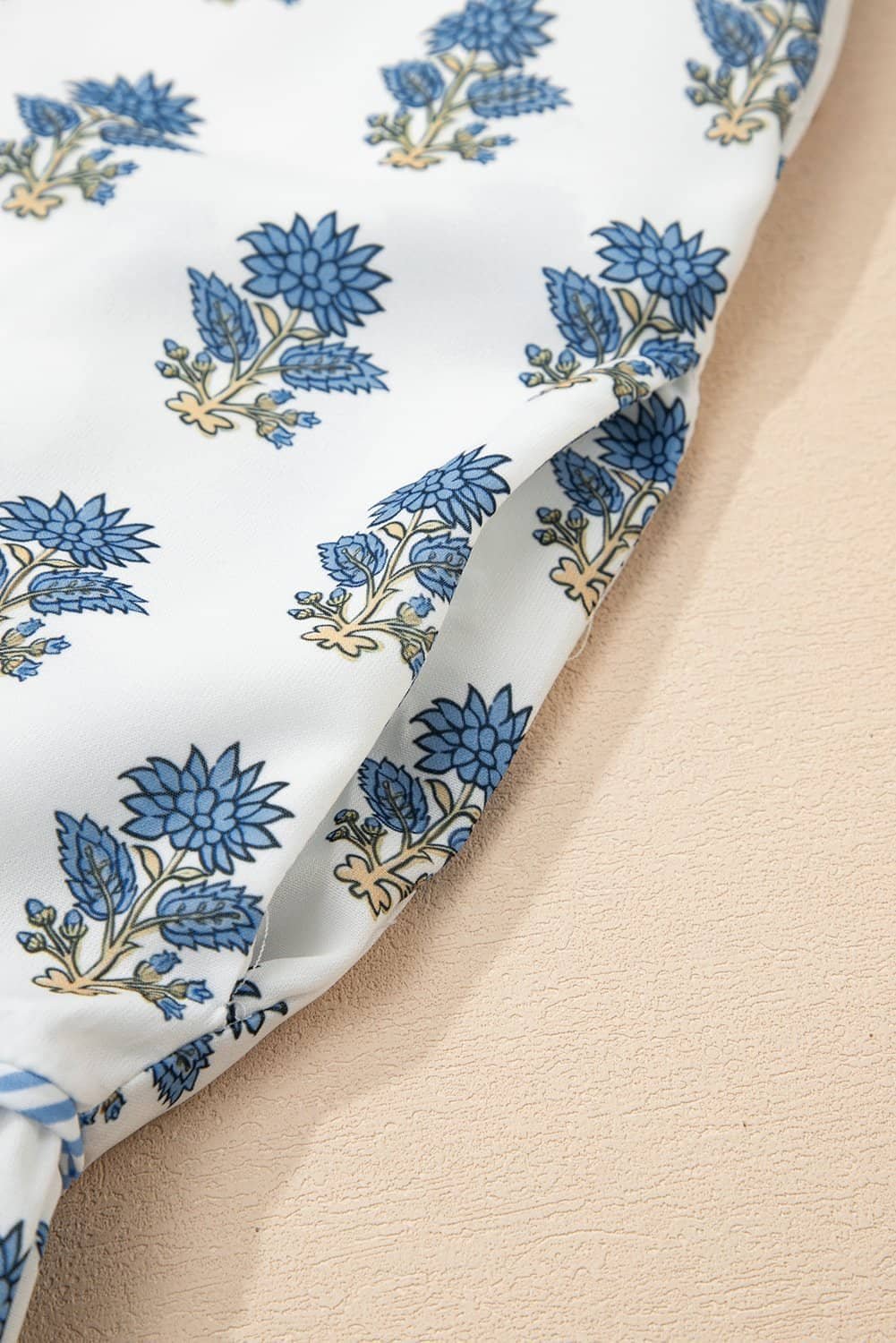 Sky Blue Floral Puff Sleeve Tied Neck Pocketed Mini Dress