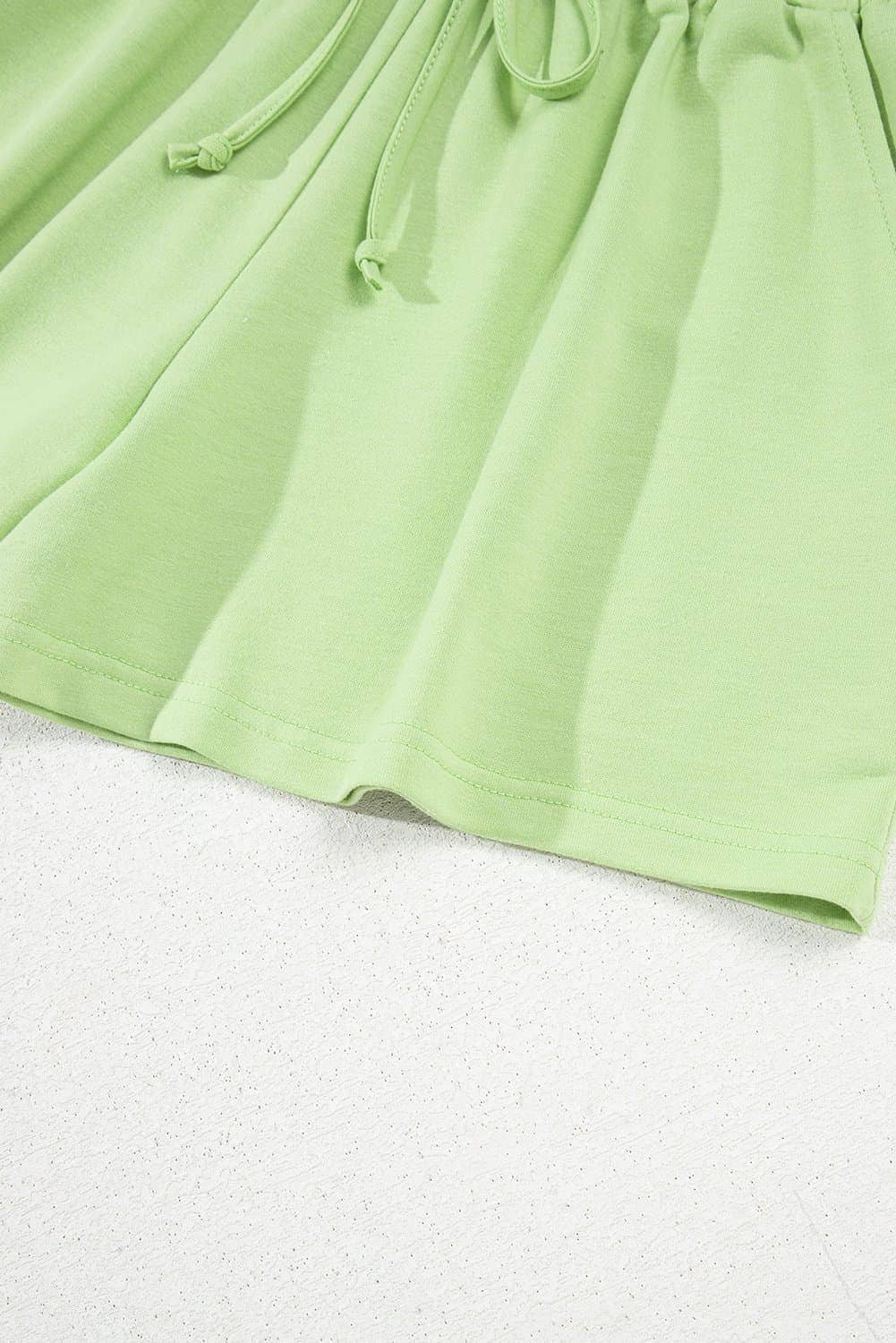 Meadow Mist Green Solid Loose V Neck Half Sleeve Tee And Shorts