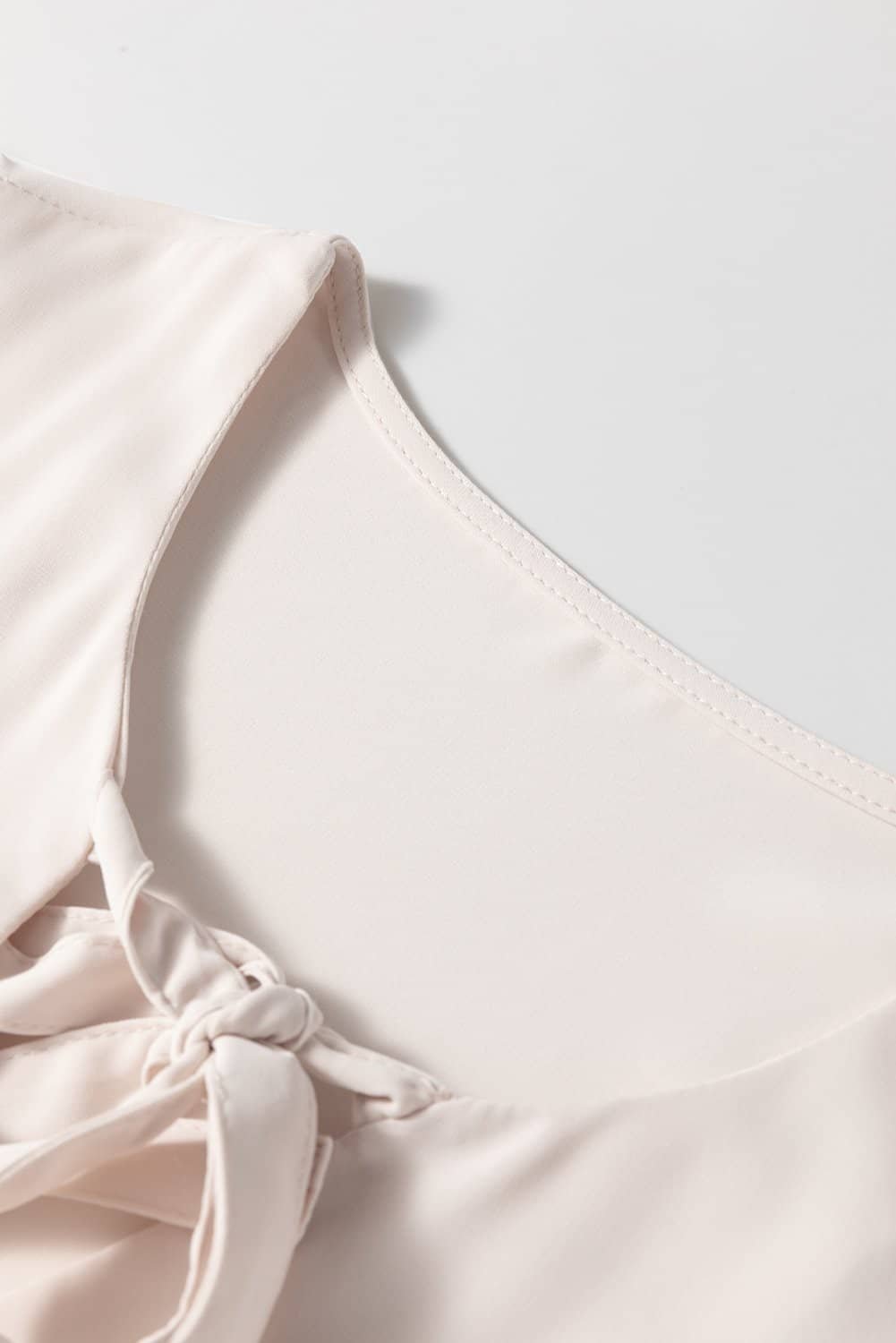 White Bow Tie Short Puff Sleeve Ruffle Hem Blouse