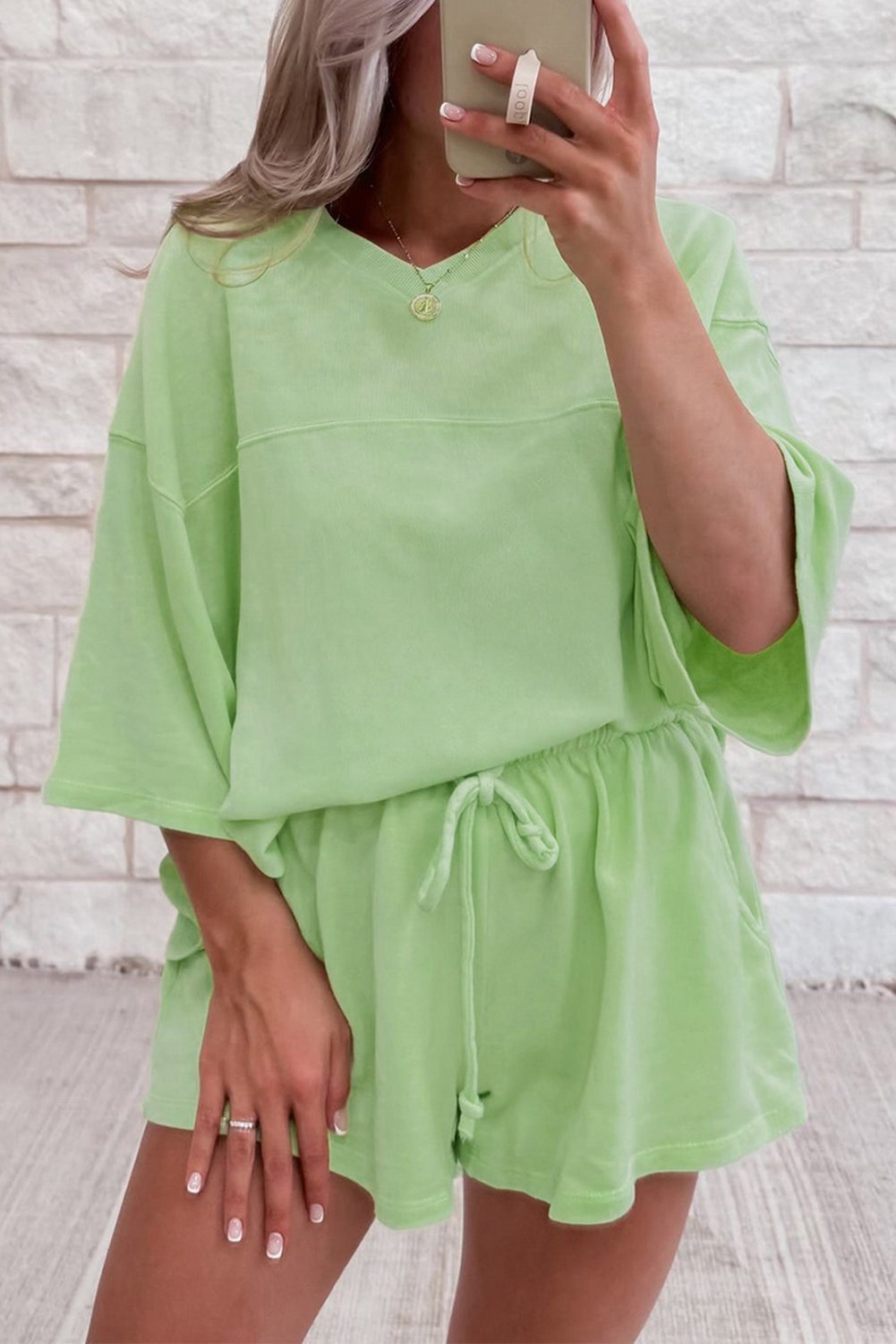Meadow Mist Green Solid Loose V Neck Half Sleeve Tee And Shorts