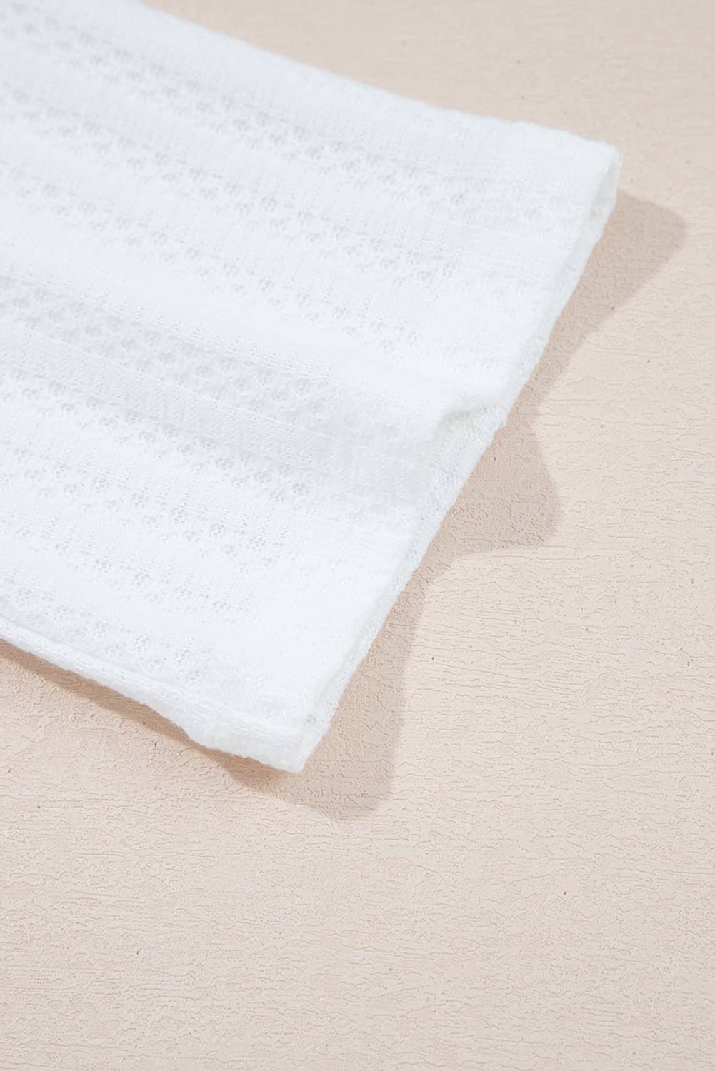 White Textured Hollow Grommet Placket Split Neck Short Sleeve Top