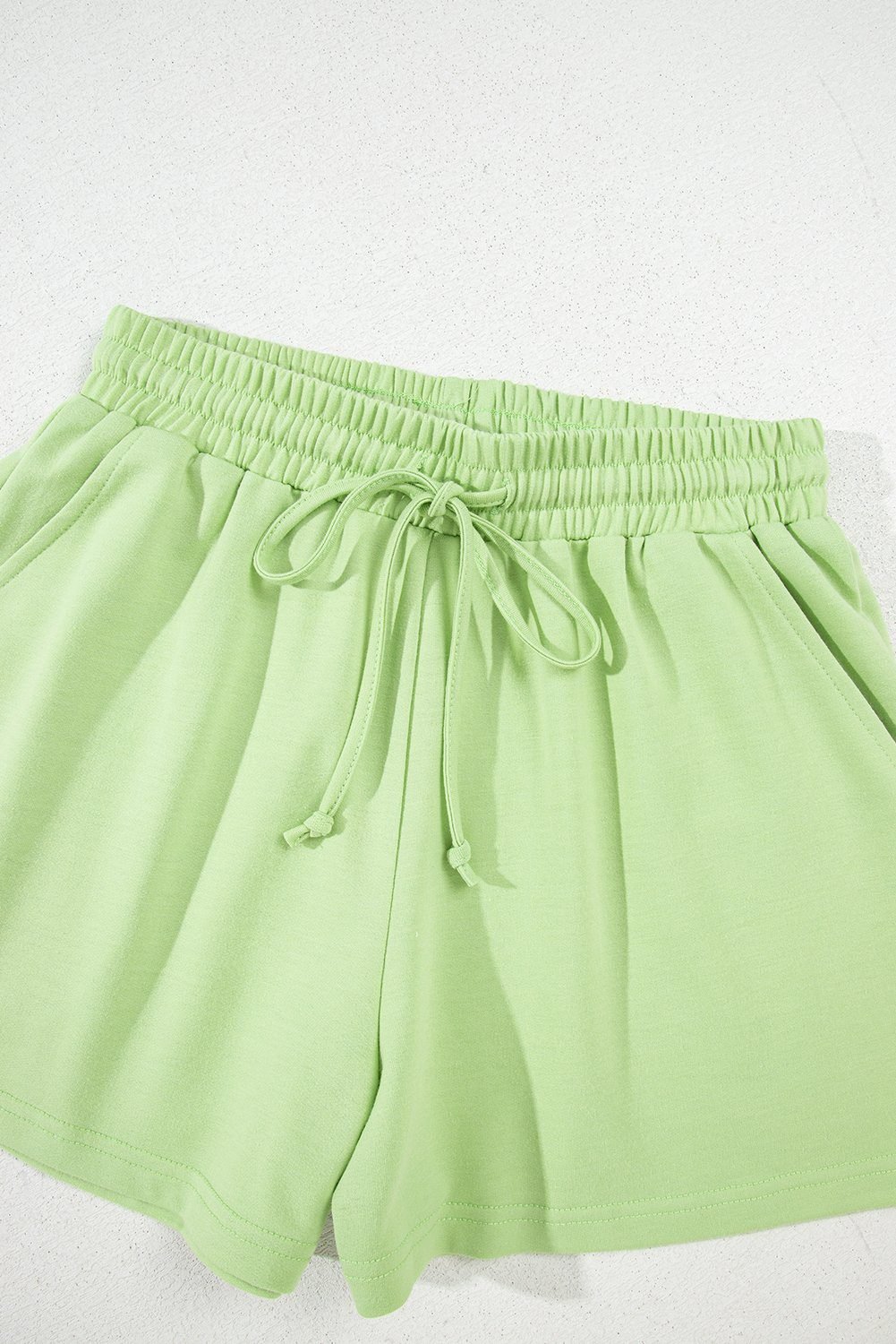 Meadow Mist Green Solid Loose V Neck Half Sleeve Tee And Shorts