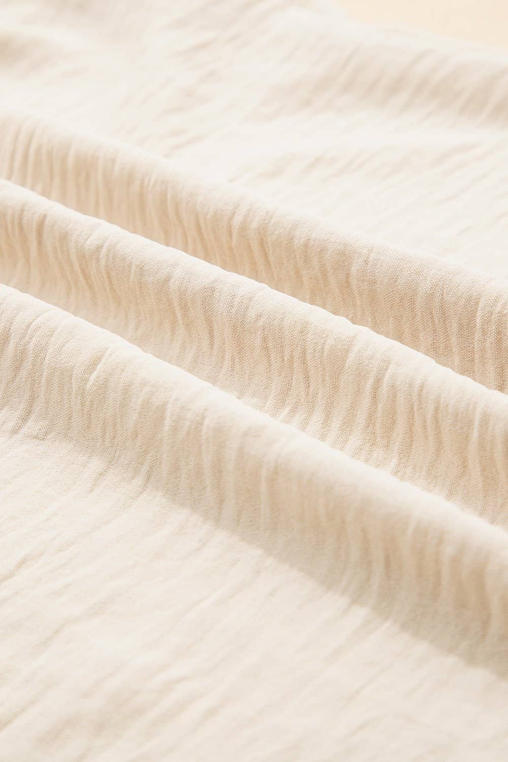 Parchment Textured Frilly Trim V Neck Sleeveless Top