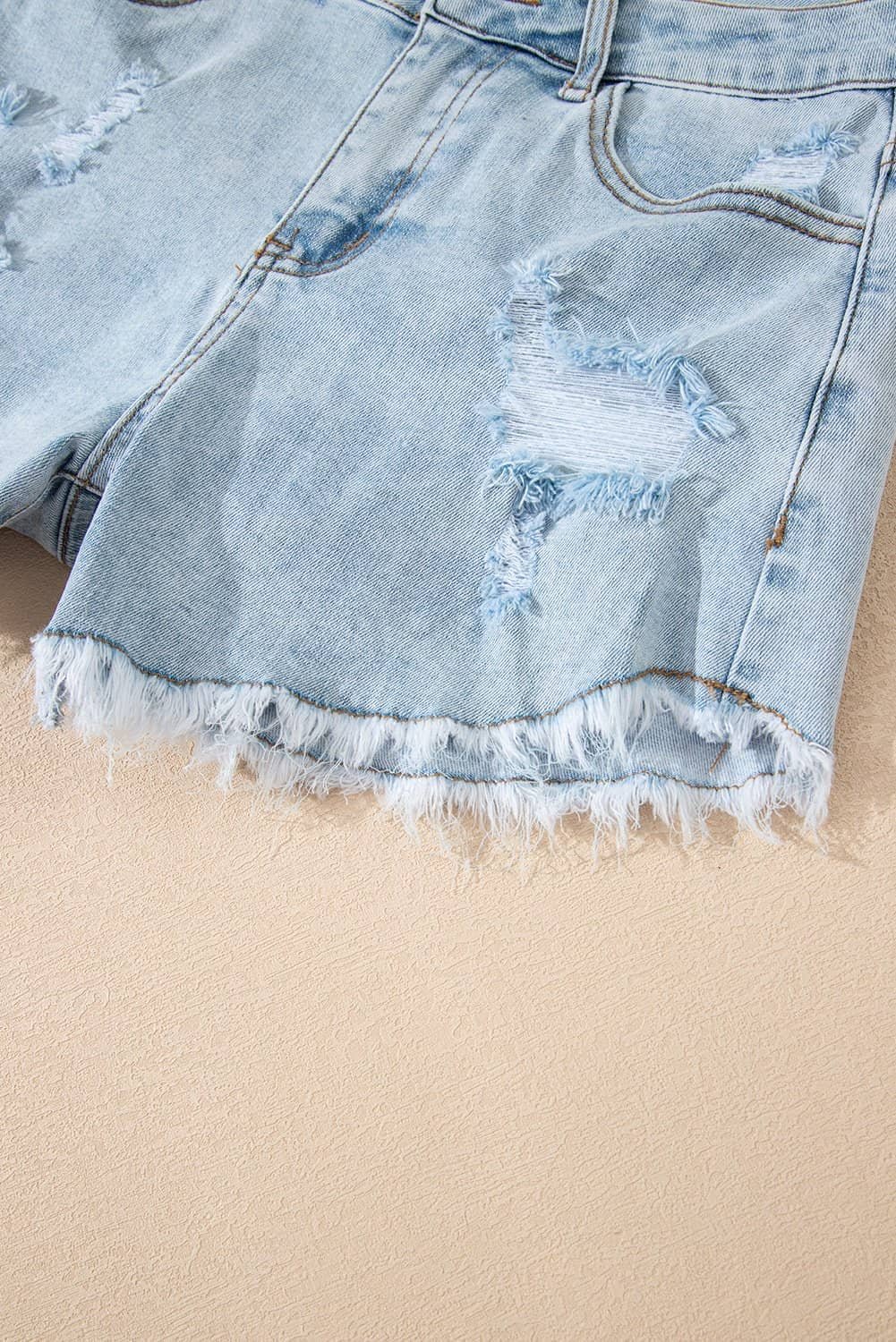 Beau Blue High Rise Distressed Raw Hem Denim Shorts