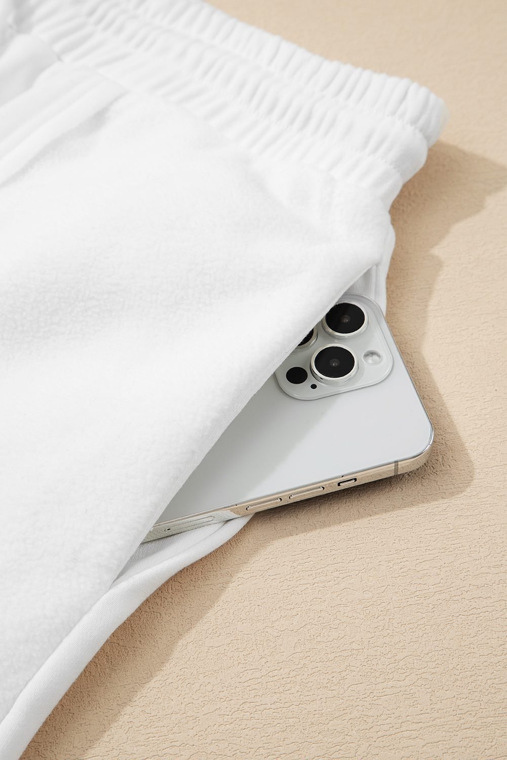 White Textured Raw Seam Plus Size Pullover Top And Drawstring Pants Set