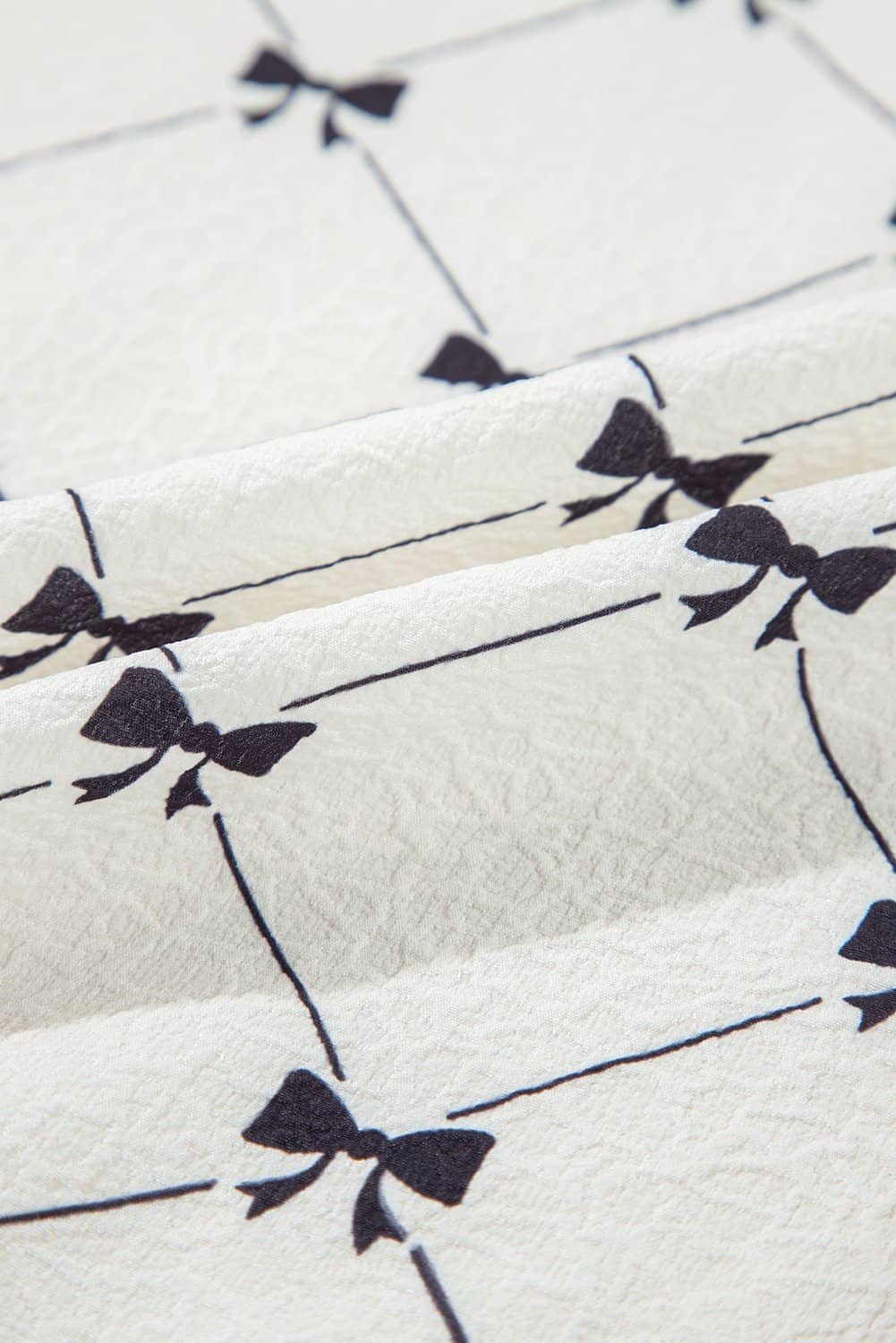 White Bowknot Print Front Knots Bubble Sleeve Blouse