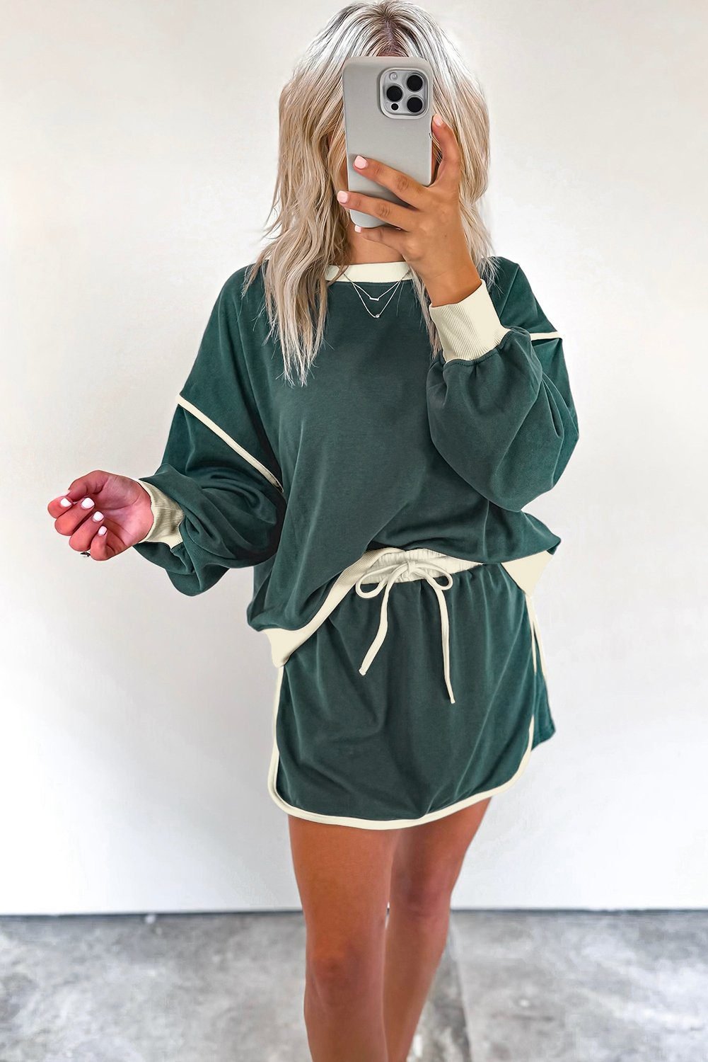 Evergreen Color Contrast Loose Pullover And Lace-Up Waist Skort Set