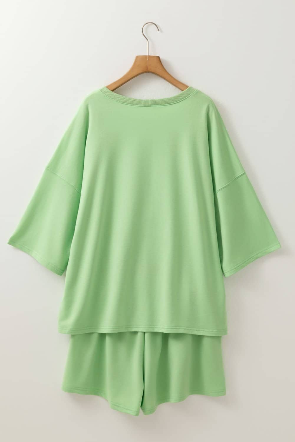Meadow Mist Green Plus Size V Neck Drop Shoulder Tee Loose Shorts 2Pcs Outfit