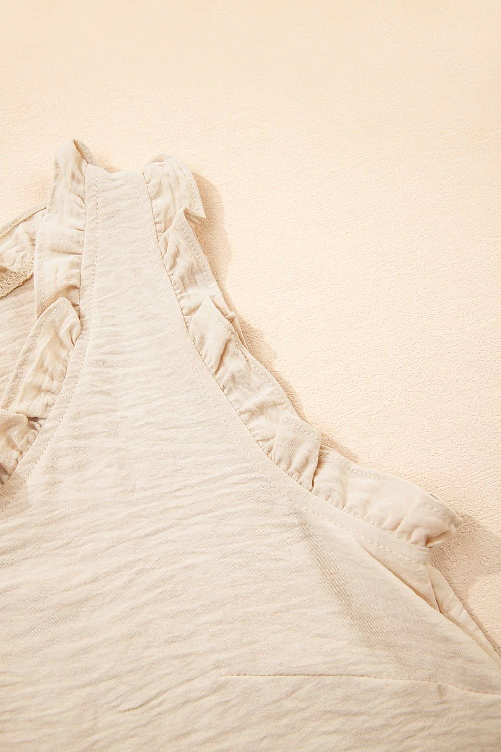 Parchment Textured Frilly Trim V Neck Sleeveless Top