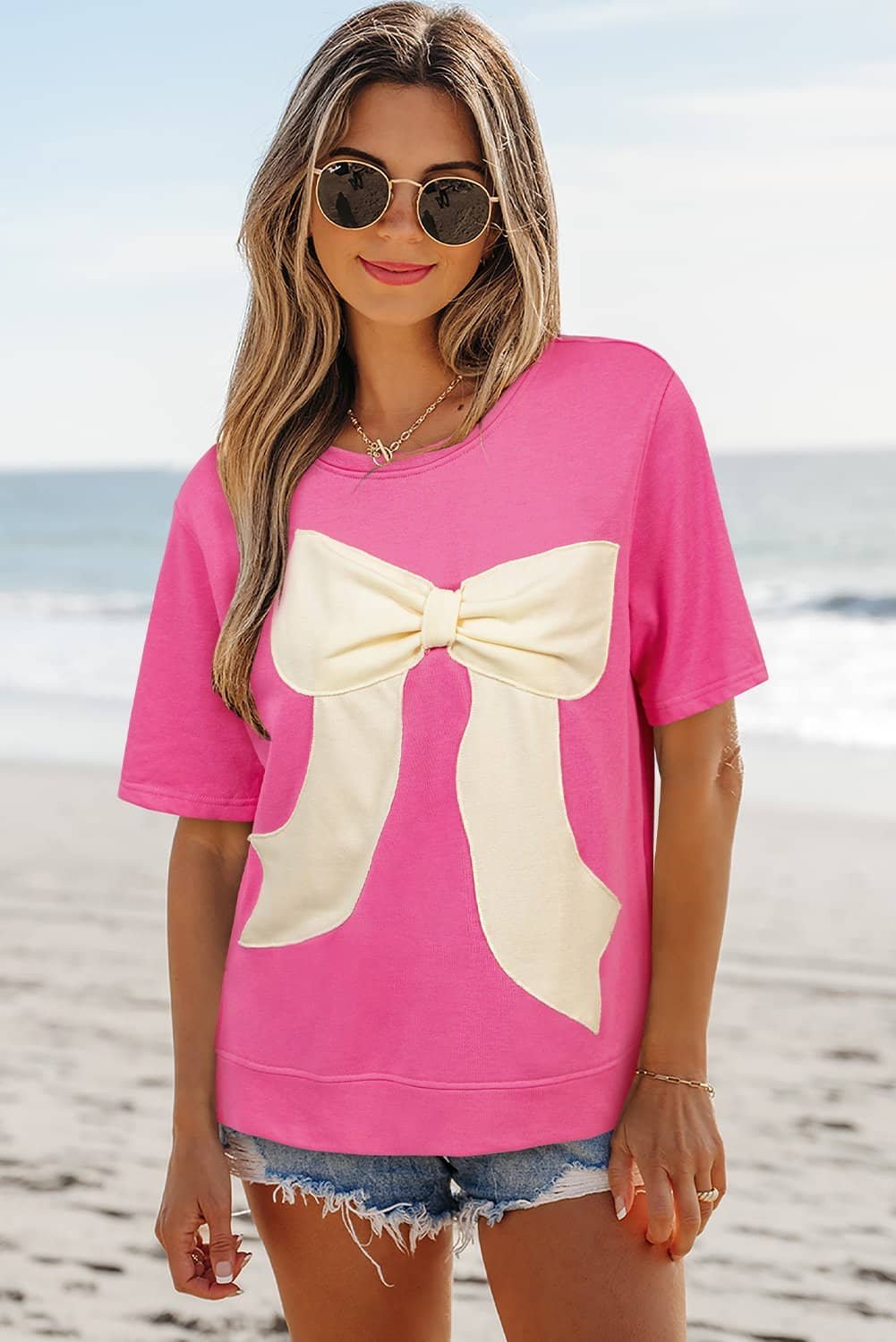 Strawberry Pink Contrasting Color Ribbon Bow Front Patch Loose Tee With Slits