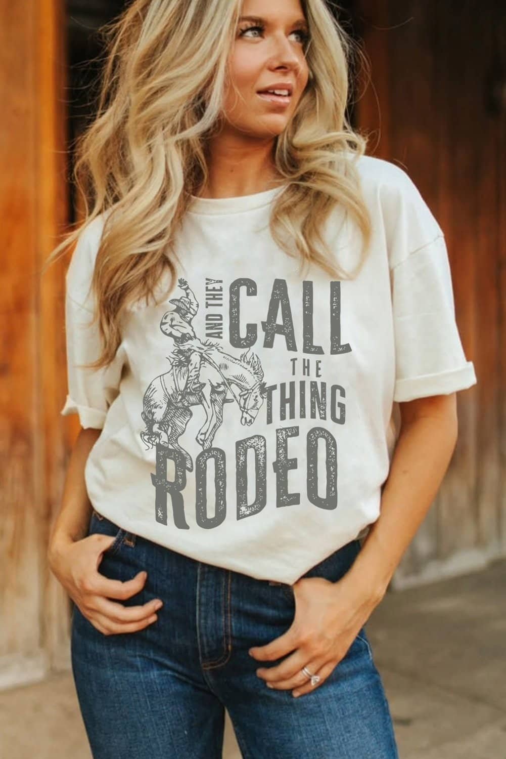 White And They Call The Thing Rodeo Print Round Neck T Shirt