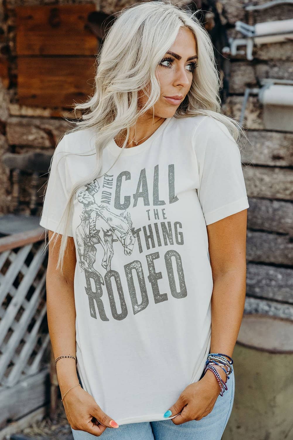 White And They Call The Thing Rodeo Print Round Neck T Shirt