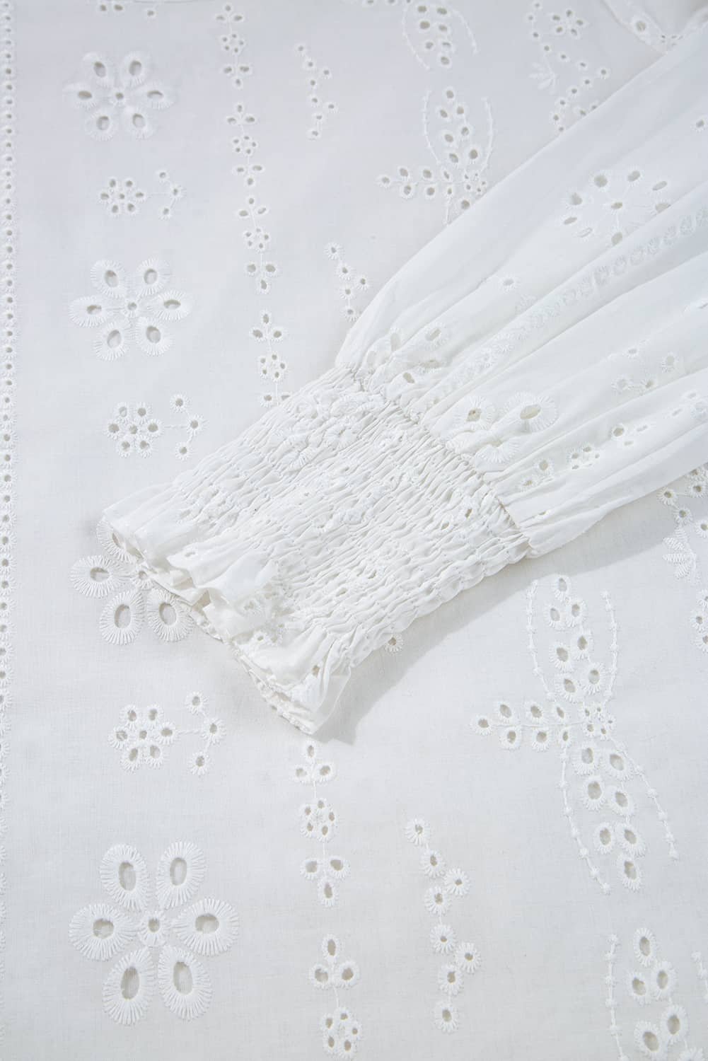 White Eyelet Embroidered Smocked Cuff Sheer Blouse