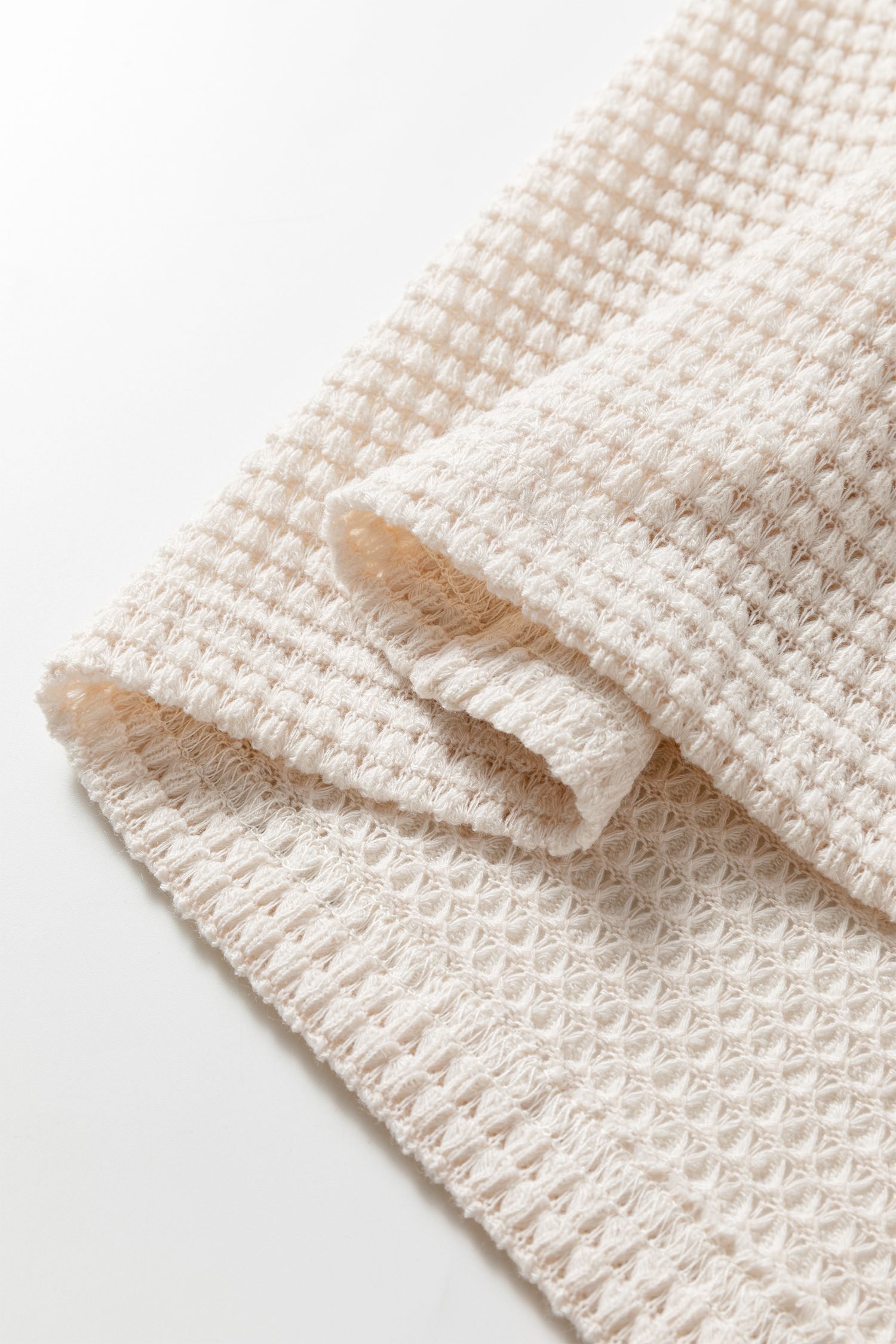 Jet Stream Solid Color Textured Knit Asymmetric Shoulder Long Sleeve Top - Image 11