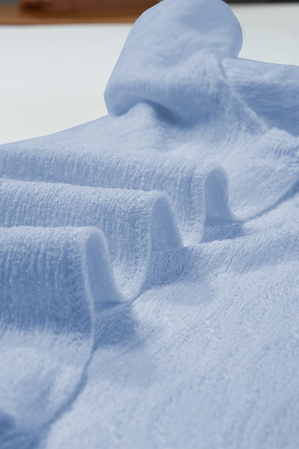 Beau Blue Solid Color Textured Notched Neck Puff Sleeve Blouse