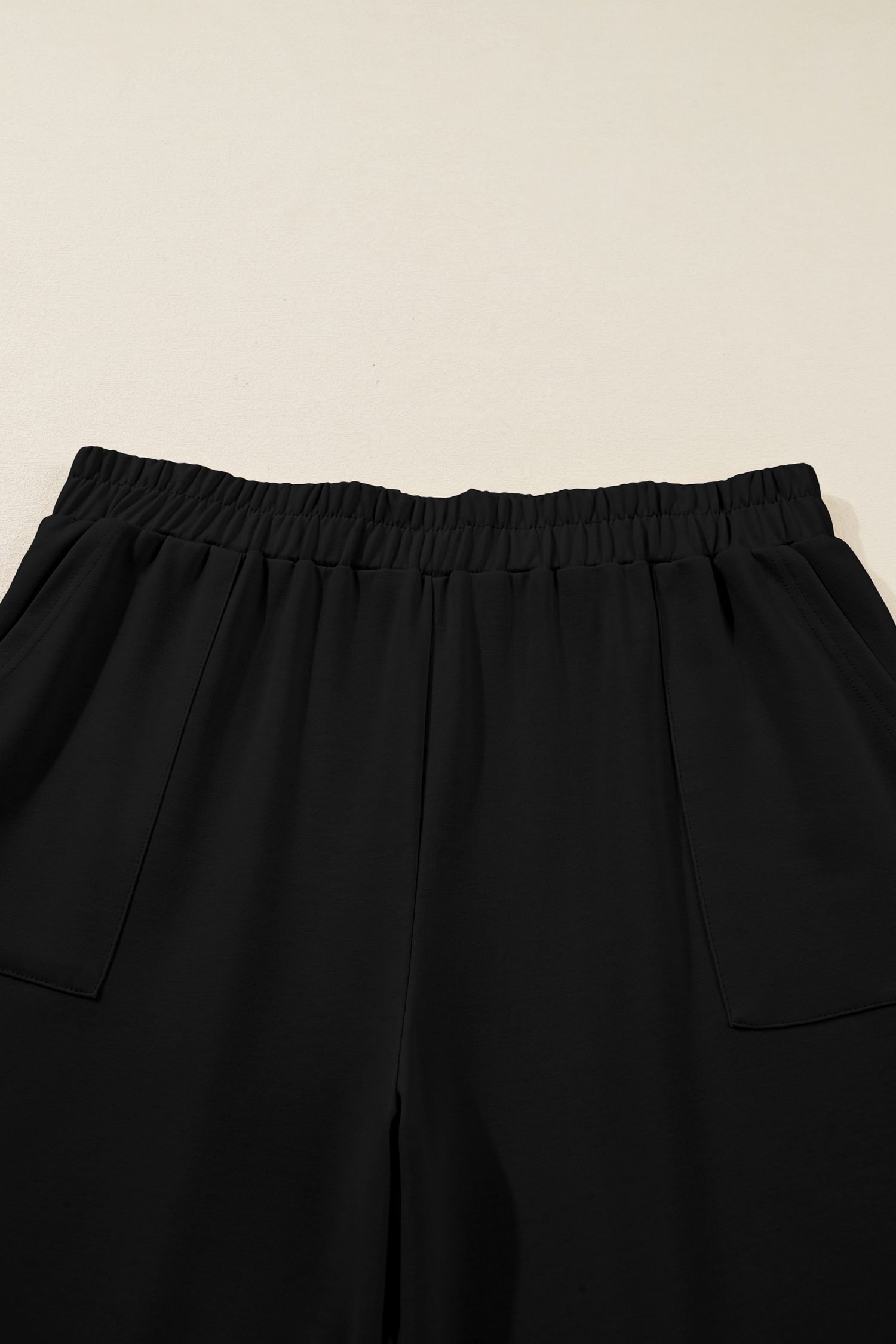 Black Plus Size Elastic Waist Asymmetrical Hem Loose Capris Pants