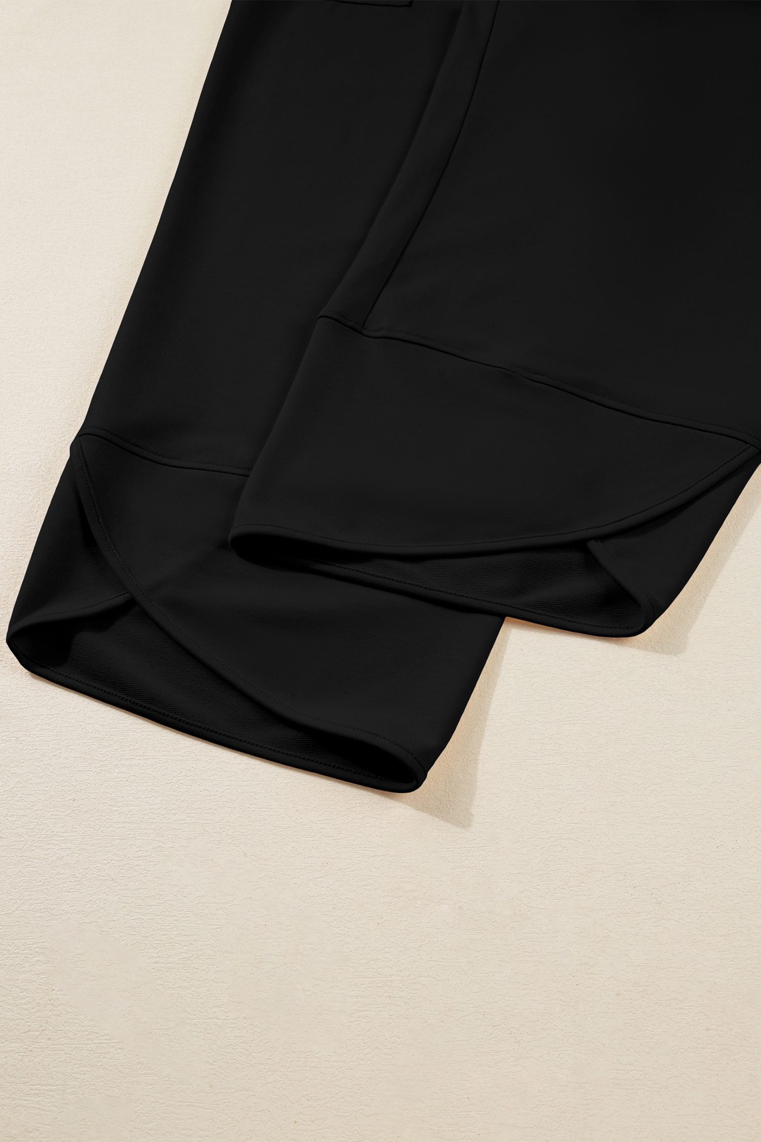 Black Plus Size Elastic Waist Asymmetrical Hem Loose Capris Pants