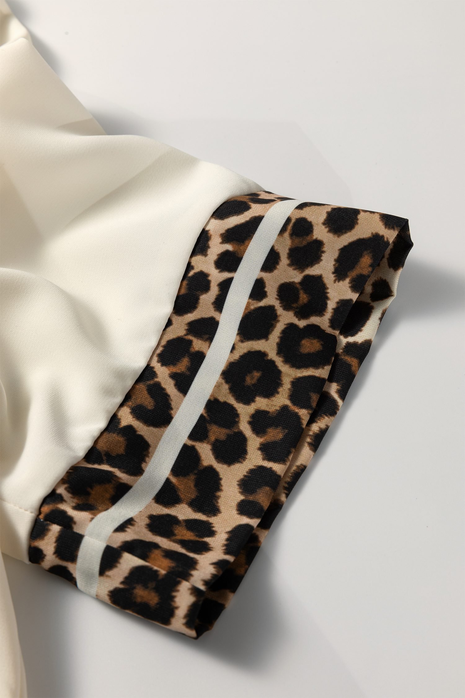 Jet Stream Leopard Patchwork Trim Split Neck Short Sleeve Blouse