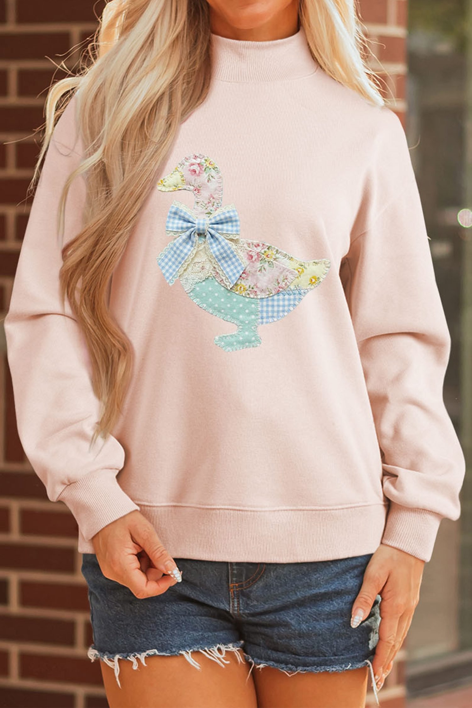 Apricot Pink Bow Knot Duck Faux Patchwork Printed Mock Neck Sweatshirt