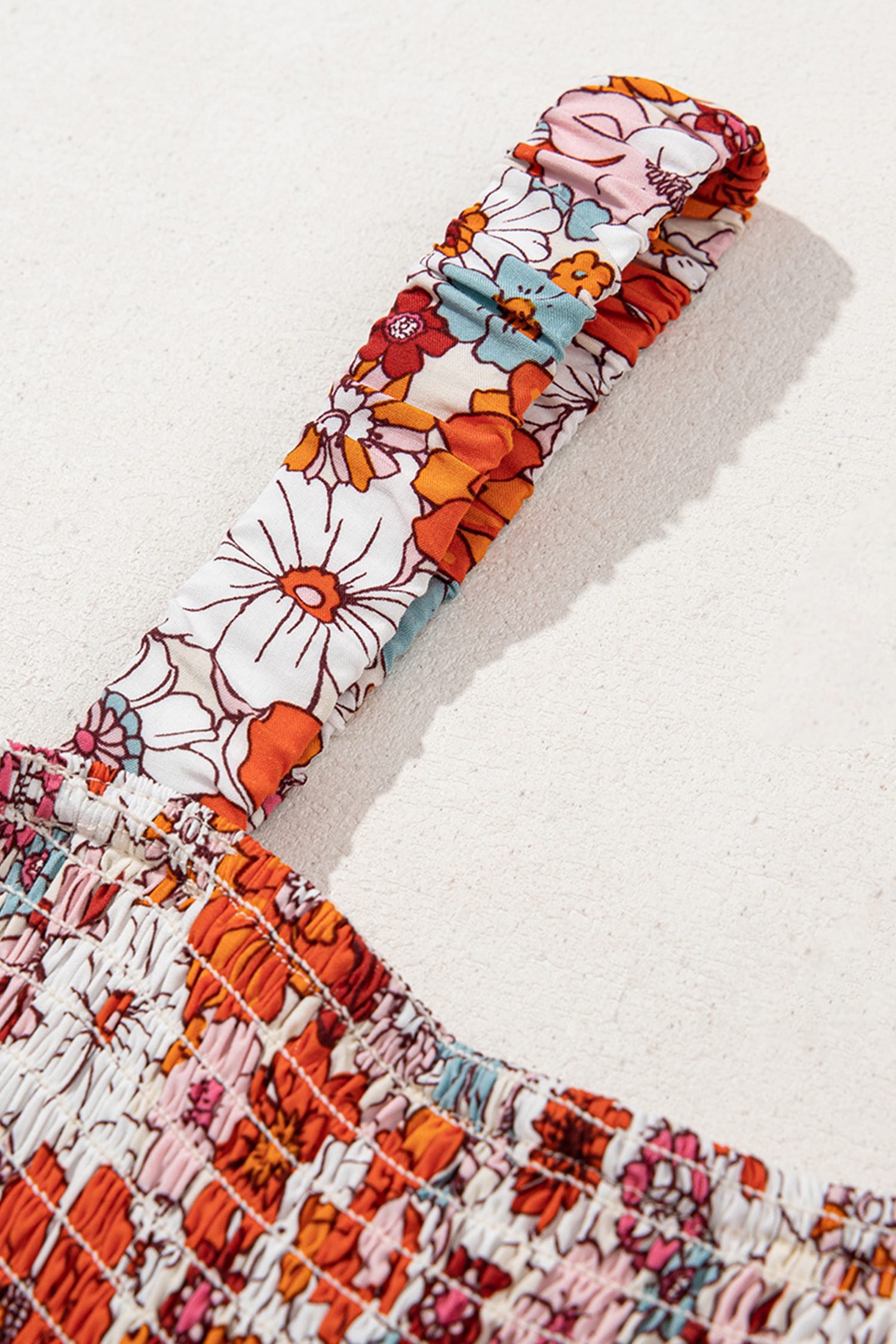 Orange Floral Print Sleeveless Smocked Shift Jumpsuit