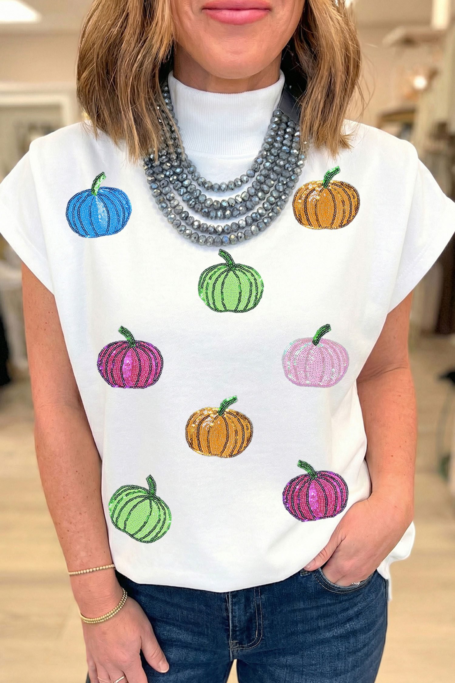 White Sequin Pumpkin Pattern Mock Neck Cap Sleeve Top